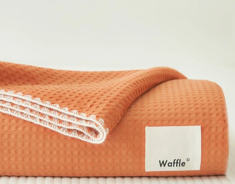 Plaid orange gaufré surpiqûres blanche 150 x 200 cm WAFFLE